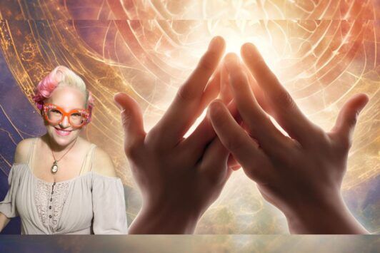 a woman with glasses and hands in the background, demonstrating a usui reiki technique in a calm setting