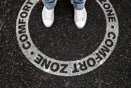 white sneakers on a path of possibility embrace how to get out of your comfort zone