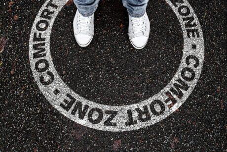 white sneakers on a path of possibility embrace how to get out of your comfort zone