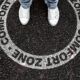 white sneakers on a path of possibility embrace how to get out of your comfort zone