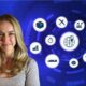 A woman stands before a blue background featuring icons, promoting a supply chain management online course